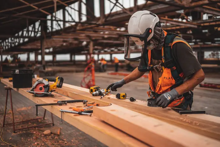 Carpenter working on timber framing